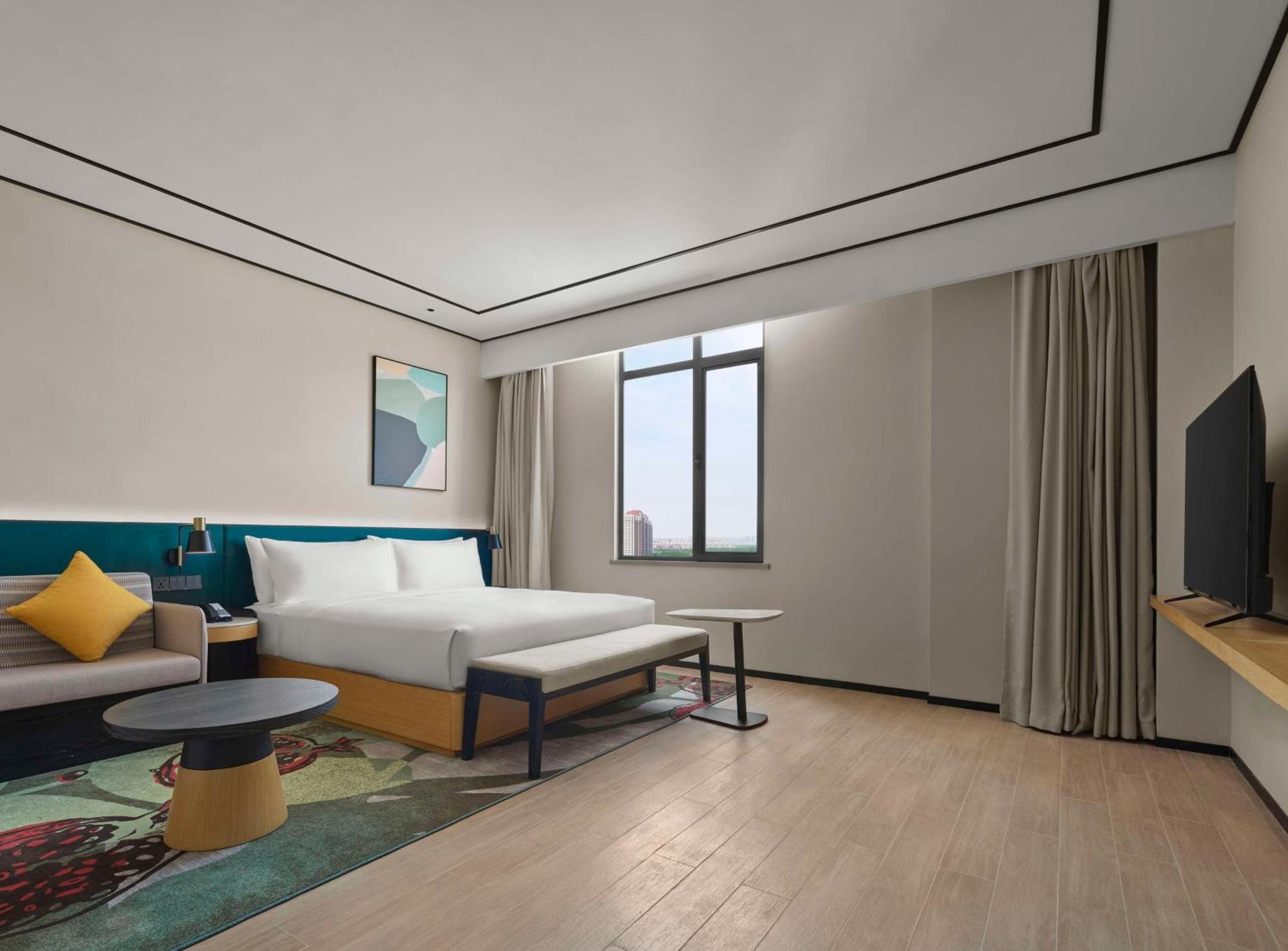 Hilton Garden Inn Tianjin Huayuan Exteriör bild