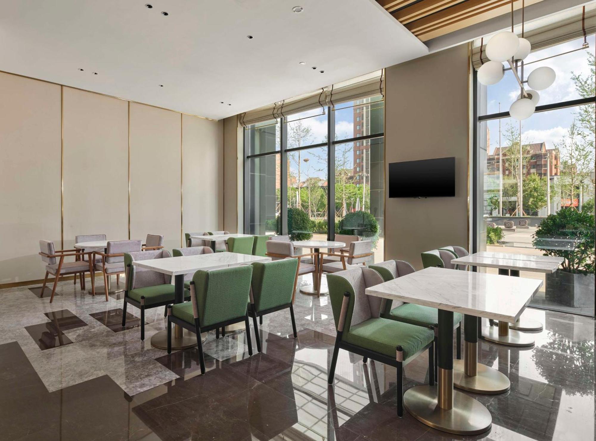 Hilton Garden Inn Tianjin Huayuan Exteriör bild